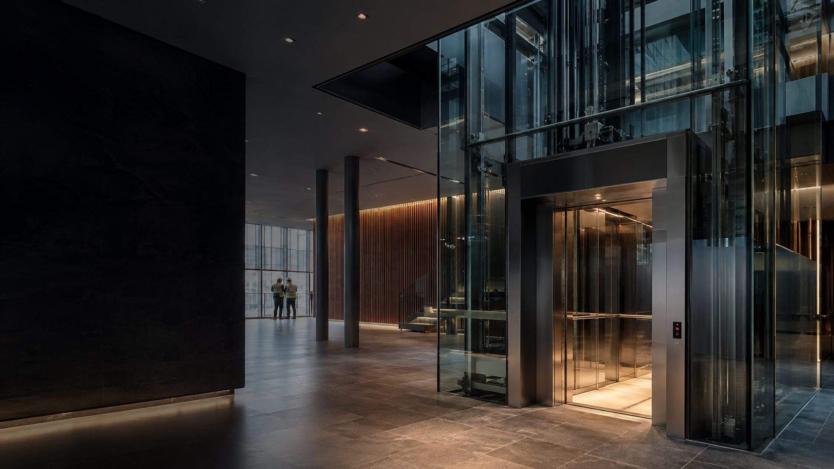 Modern commercial elevator installation and lift lobby